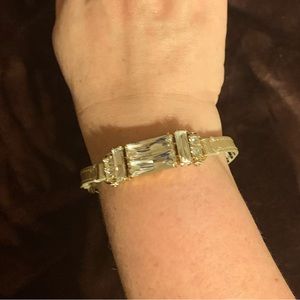 GOLD Leather, hardware and large clear cut stone/ HENRI BENDEL cuff strap